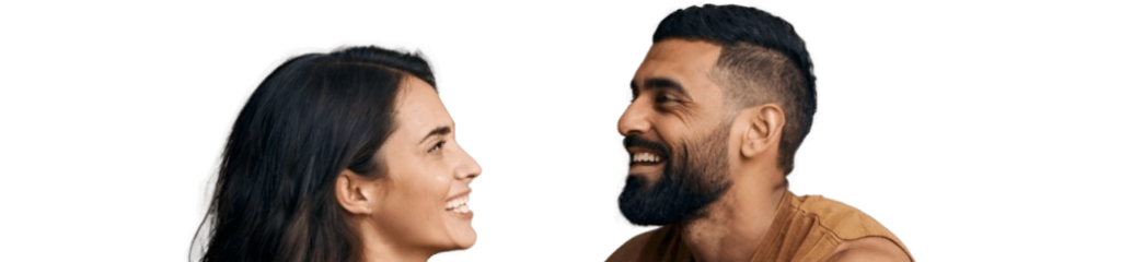 Smiling couple looking at each other, representing connection and compatibility